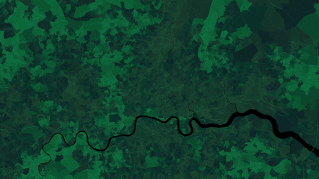 A satellite image of an area bisected by a river