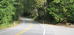 photo of a curve in a rural road