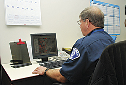 photo of county employee working at computer