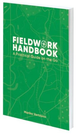 A green book cover reads Fieldwork Handbook: A Practical Guide on the Go.