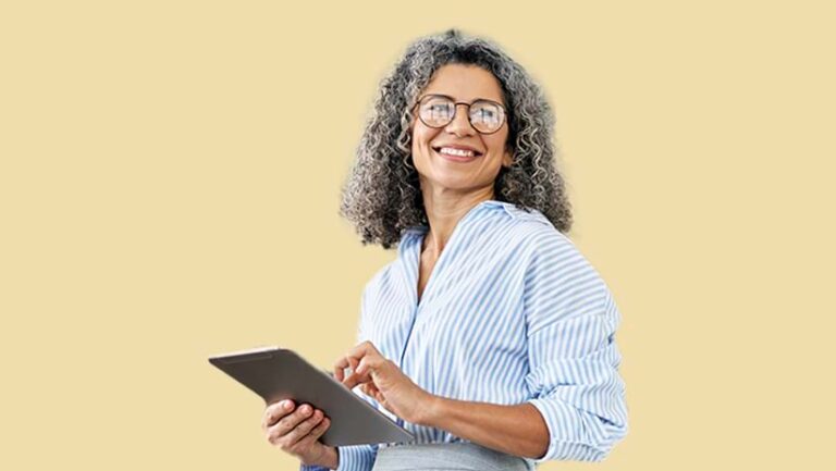 A curly haired woman using a tablet who represents the Viewer user type