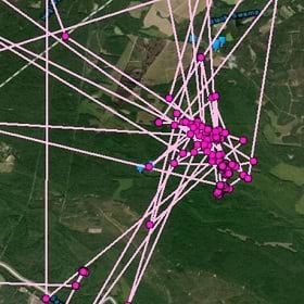 A map with a cluster of magenta dots signifies supply chain visibility.