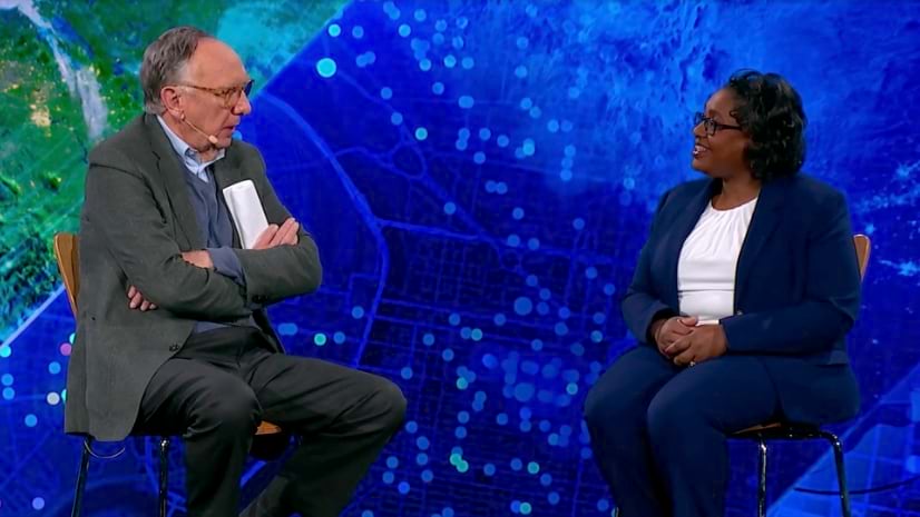 Esri president Jack Dangermond and NGA deputy director Tanya P. Wilkerson talk together on stage