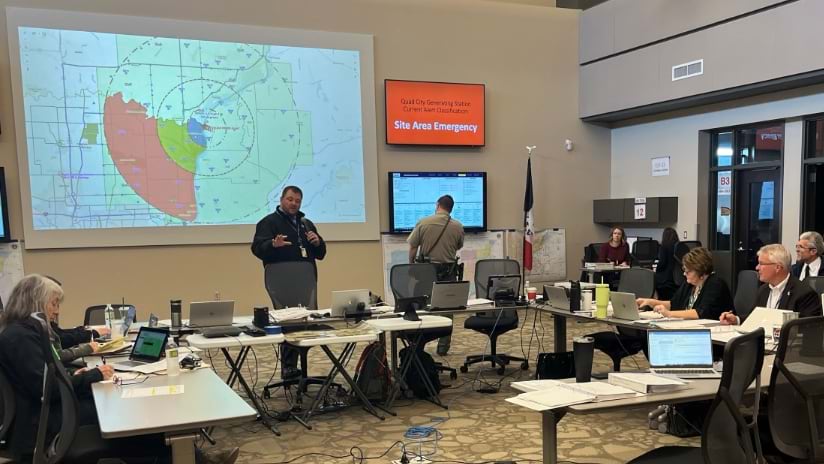 Officials with Scott County emergency management simulate their response during a nuclear radiation event