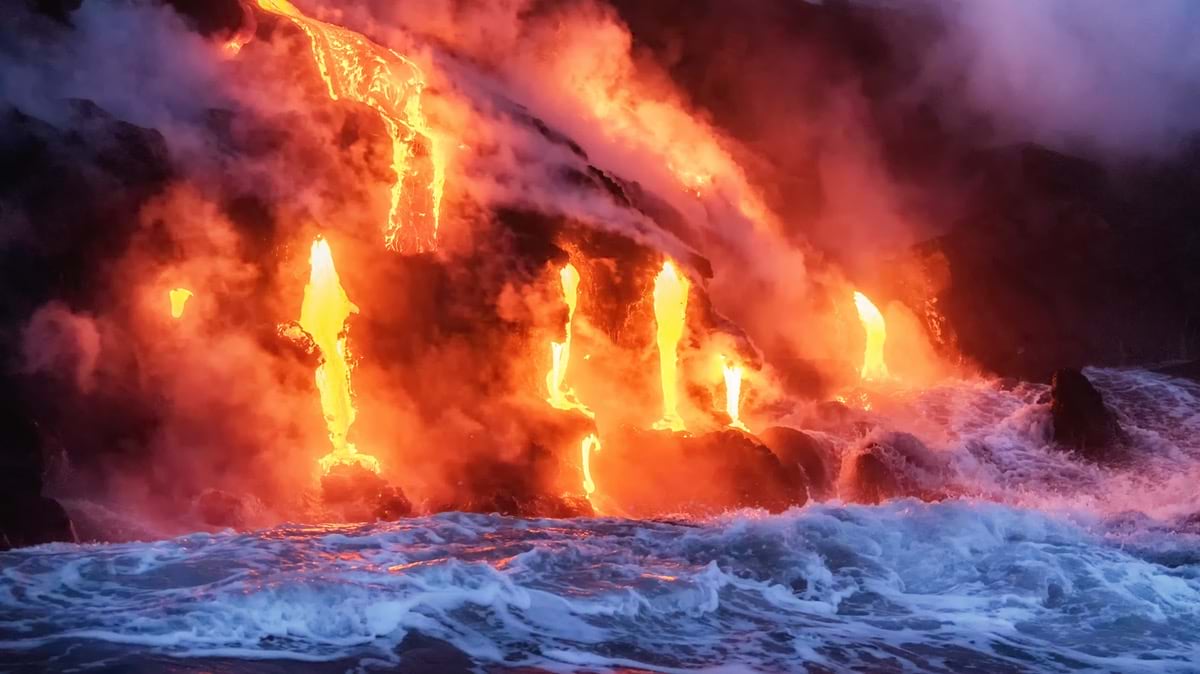 Molten lava flowing into the Pacific Ocean on Big Island of Hawaii