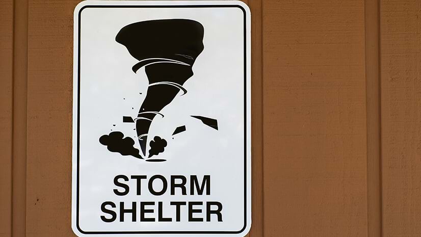 A storm shelter sign signifies the concept of a climate haven