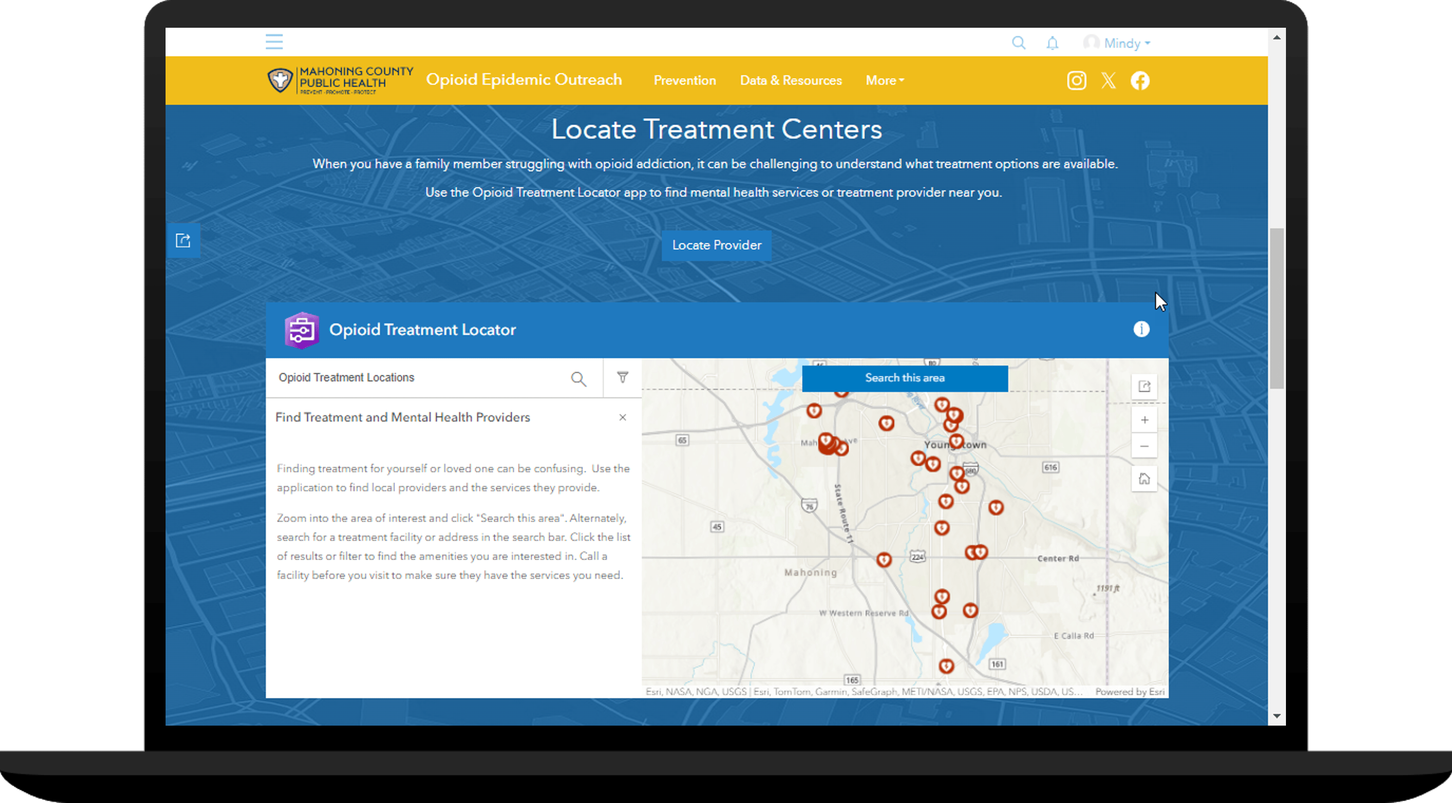 A laptop screen showing the Locate Treatment Centers interactive web map.