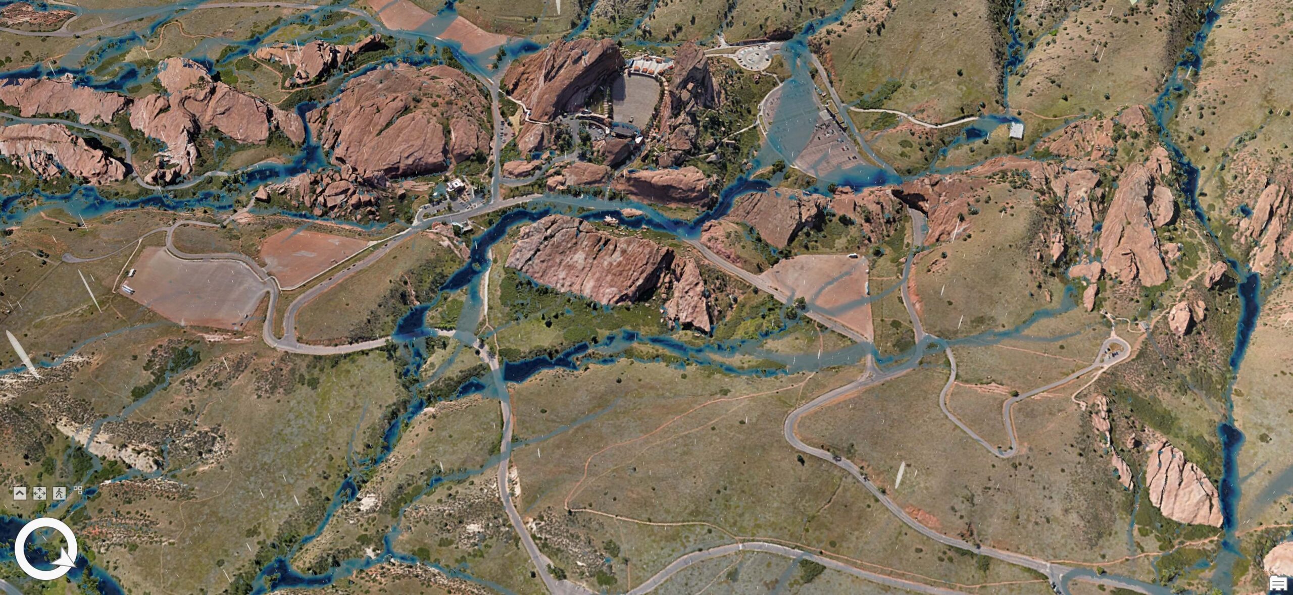 A screen shot of Red Rocks Ampitheater and surrounding areas with rainfall routes in blue.