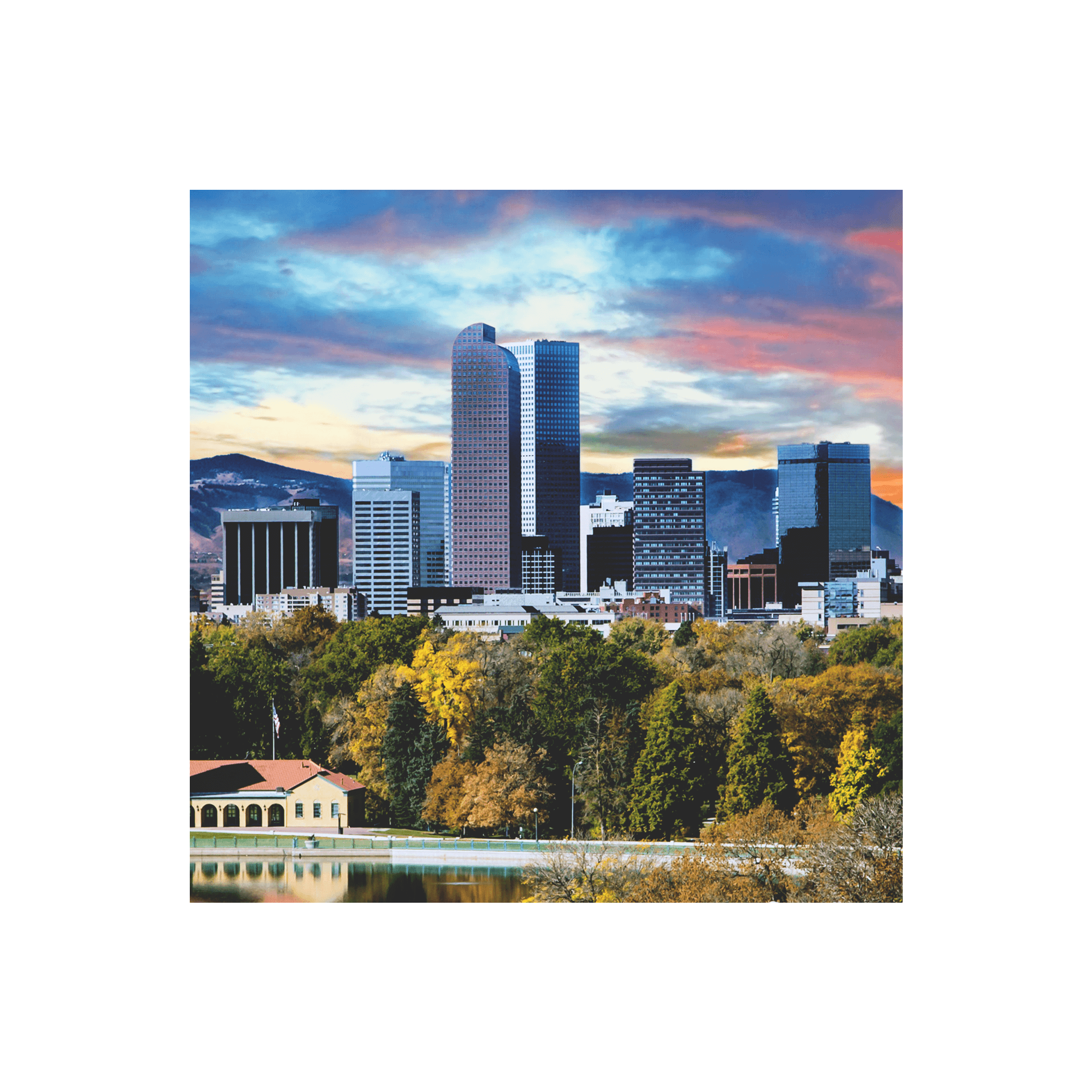 The Denver, Colorado, skyline under a sunset-colored sky