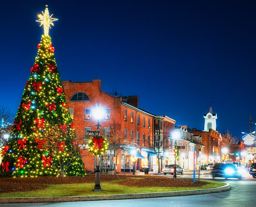 A plaza with a Christmas tree.