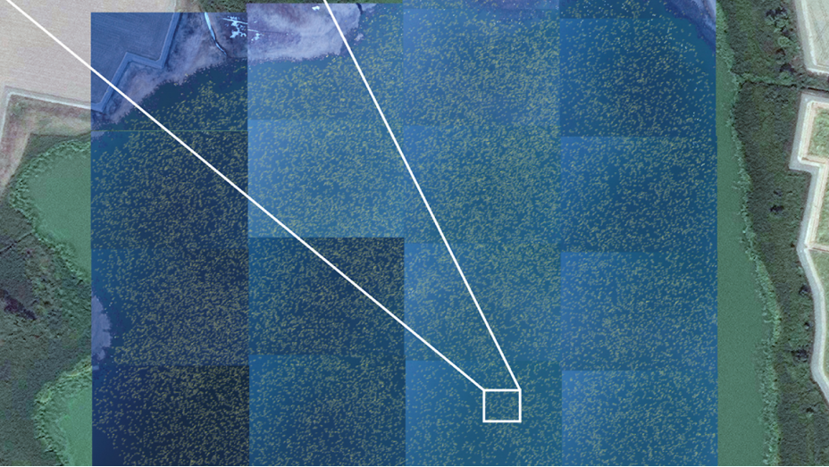 Map overlaid with tonal blue squares; two white lines radiate from a white rectangle