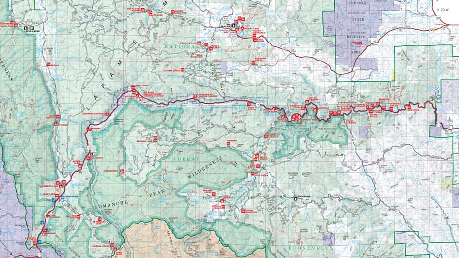 Closeup of a highly detailed atlas map of the Arapaho & Roosevelt National Forests showing recreation and travel related information
