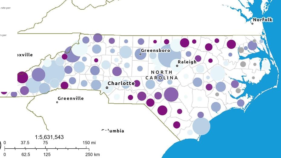 Map of North Carolina with mutlicolored circles of varying size scattered across the state