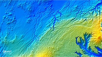 Topographic map shading from blue to green, displaying canyons and waterways