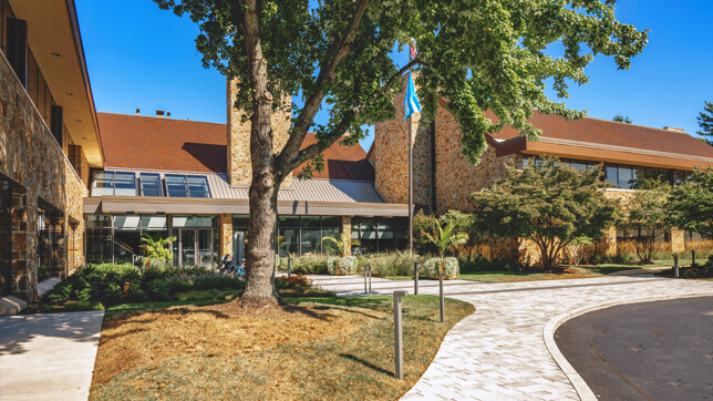 The exterior of the Philadelphia area Esri offices with fall landscaping and entrance location