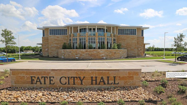 The exterior of City Hall in Fate, Texas, on a sunny day 
