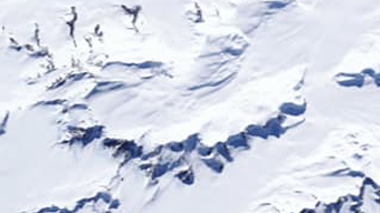 A satellite image of a mountainous region of Antarctica in white and blue