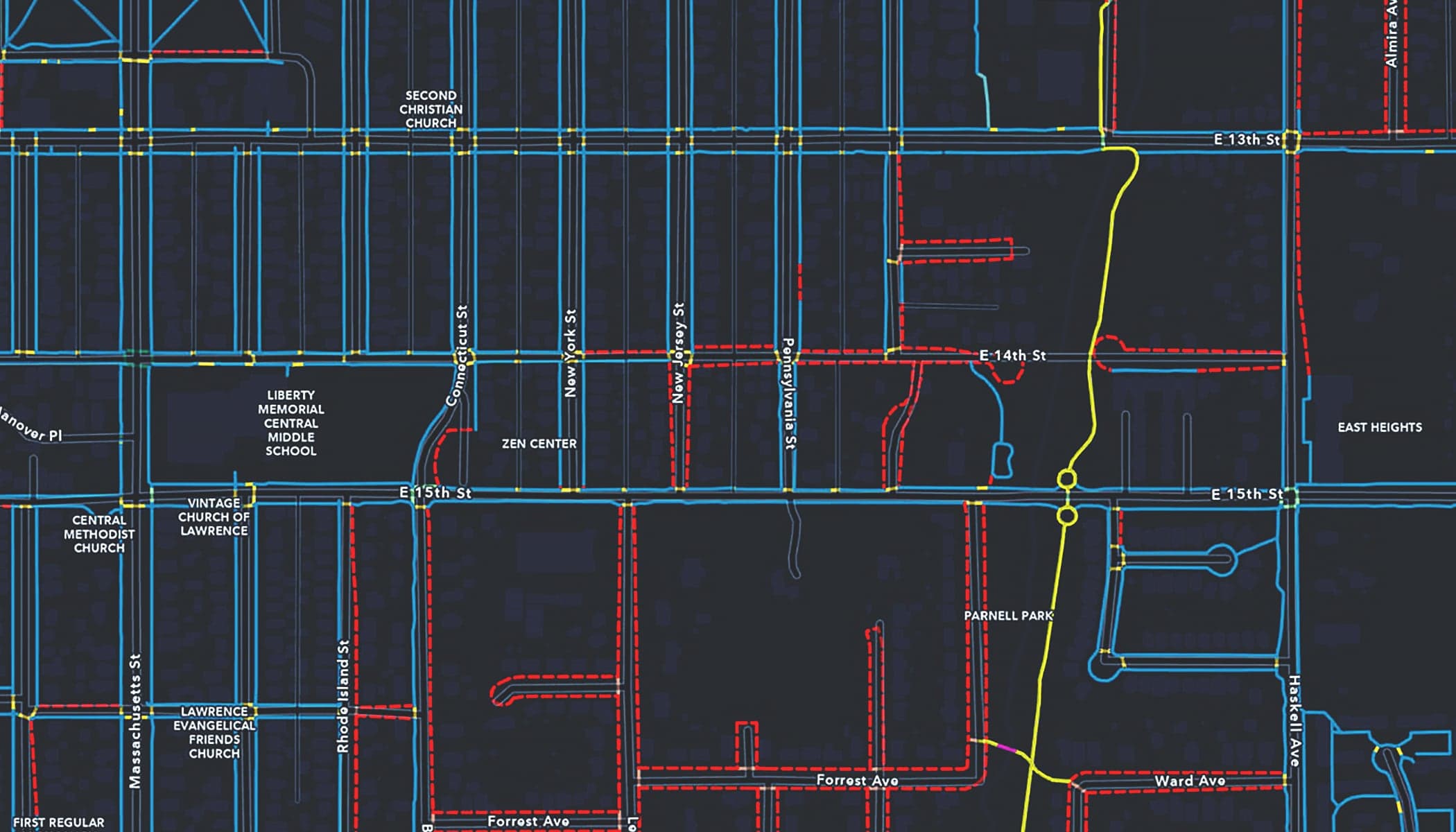 A street map with routes outlined in blue and red on a dark gray background