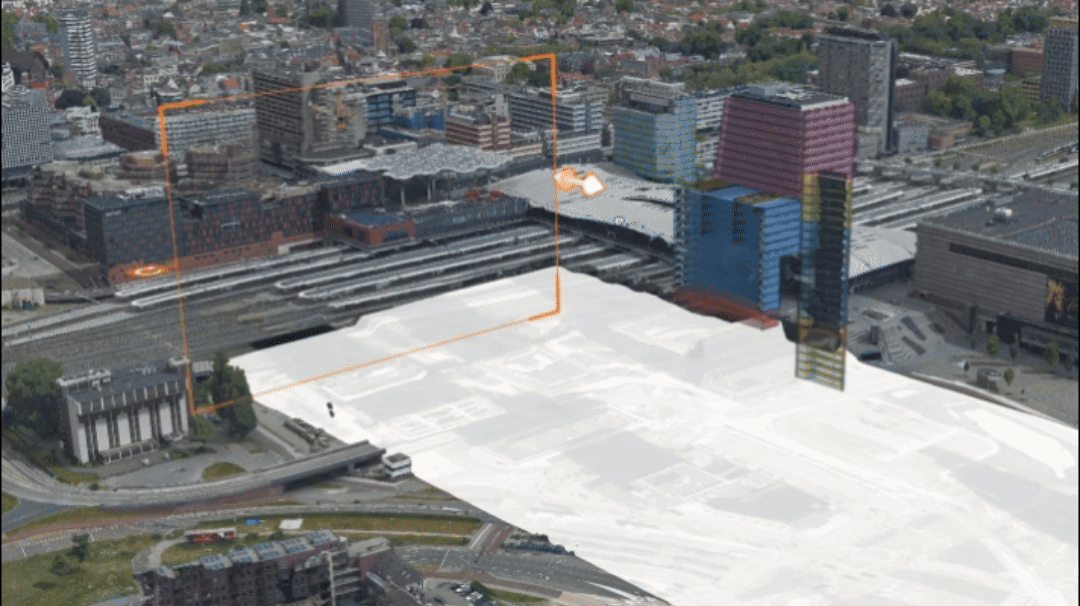 Demonstração mostrando um mouse de computador arrastando-se por uma cidade modelada em 3D para mostrar a adição de 7 novos edifícios multicoloridos 