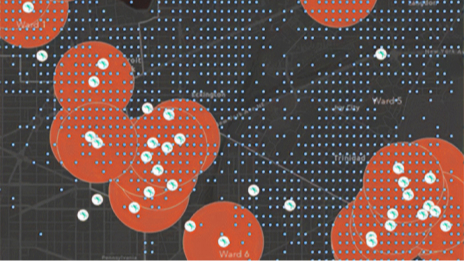 Overlapping red circles and scattered white data points representing a cluster of data tracks showing co-traveling patterns 