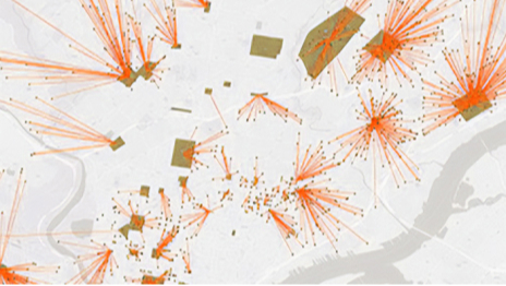 Série de cercles rouges d’où partent des lignes rouges dans un modèle scintillant représentant une carte qui affiche les modifications d’emplacement d’entité 