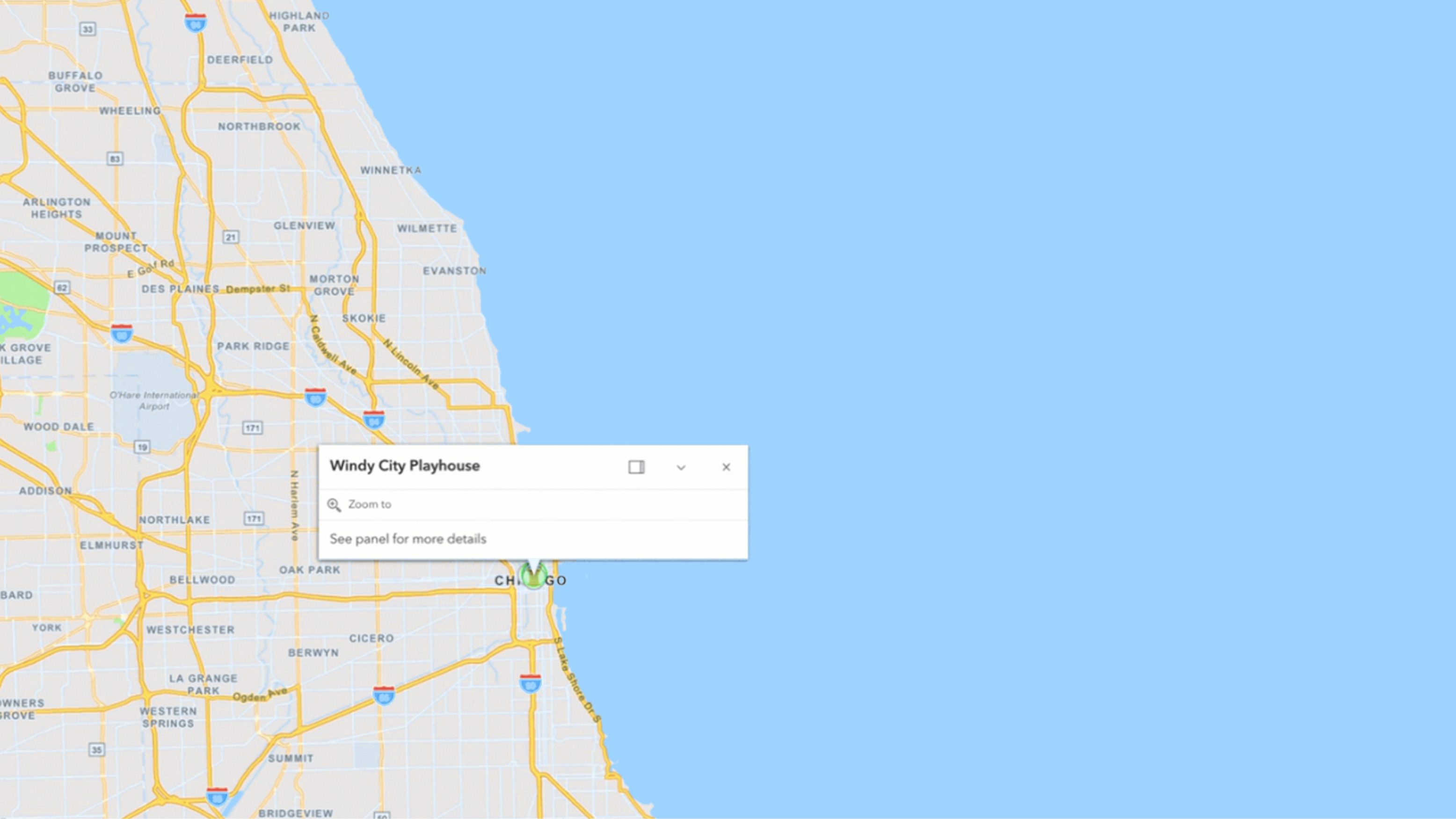  A beige map with roads highlighted in yellow and neighborhood names in black text depicting the sea and showing information details about a specific location