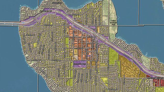 Vue aérienne d’une ville. L’image représente la carte détaillée d’une ville avec des rues, des bâtiments et d’autres entités clairement marquées.