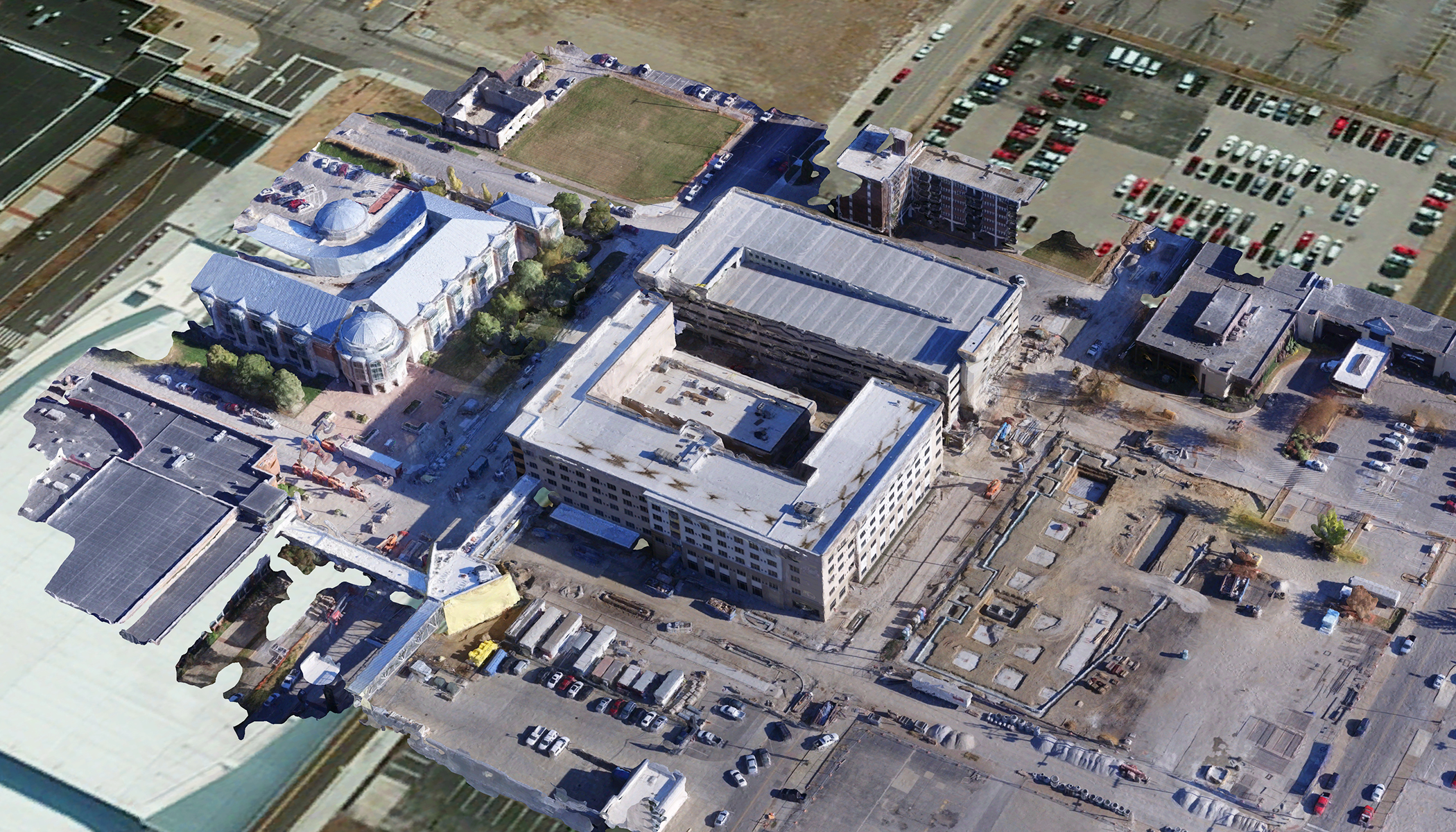 3D model of a school campus with cars, windows, and other objects shown in fine detail