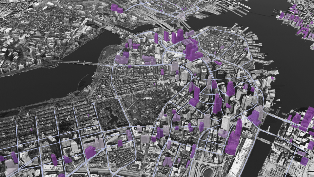 Immagine 3D in bianco e nero di alcune strade ed edifici di una città con progetti di edifici selezionati evidenziati in viola 
