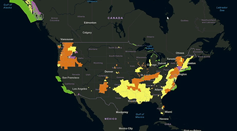 A map of North America with certain areas highlighted in yellow, orange, green, and purple overlaid with a play button 