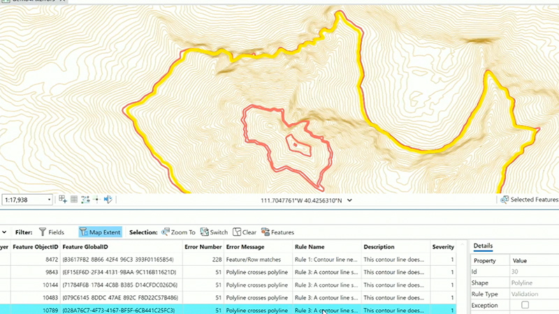 ArcGIS Pro에서 Data Reviewer 검사를 나타내는 맵 및 데이터가 표시된 노트북으로 작업하는 손 