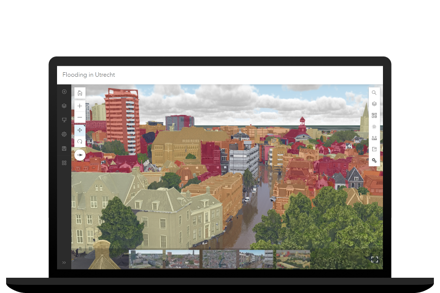 Изображение монитора ноутбука, на котором отображается 3D-модель красочного города, обсаженного деревьями