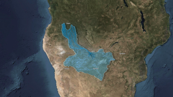 Una imagen digital de tierra y agua que representa las vías fluviales del Okavango, con una masa de agua resaltada en azul