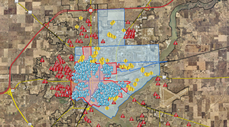 Map of Decatur, Illinois in brown and blue with scattered red, blue, and yellow map points