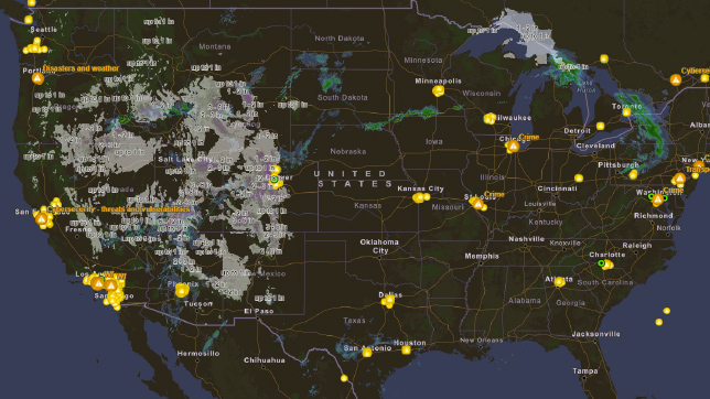 Mapa preto dos Estados Unidos mostrando manchas cinzentas e pontos de dados amarelos dispersos