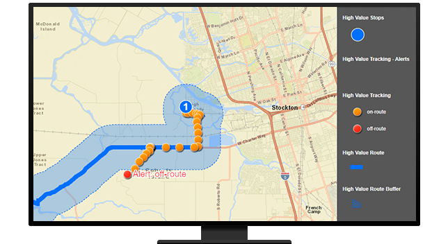 图片中的计算机显示器在米色背景上以黄色和蓝色显示了街道地图上的路径点 
