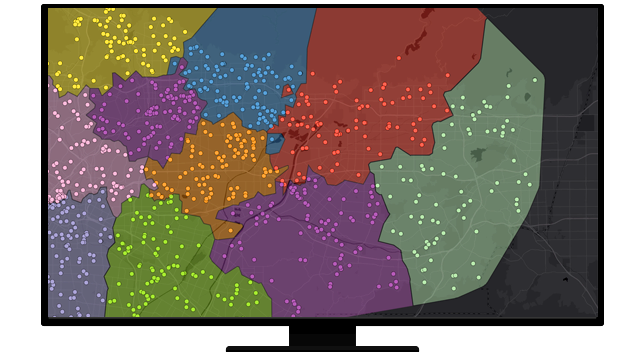 Ilustracja przedstawiająca monitor komputera wyświetlający mapę obszarów w różnych kolorach