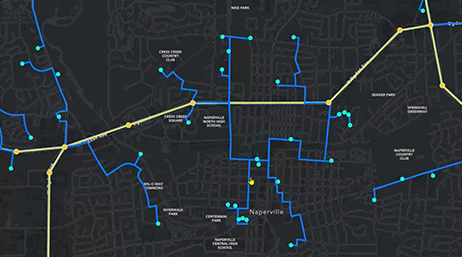 Simple street map with routes lit up in yellow and blue on a dark gray background