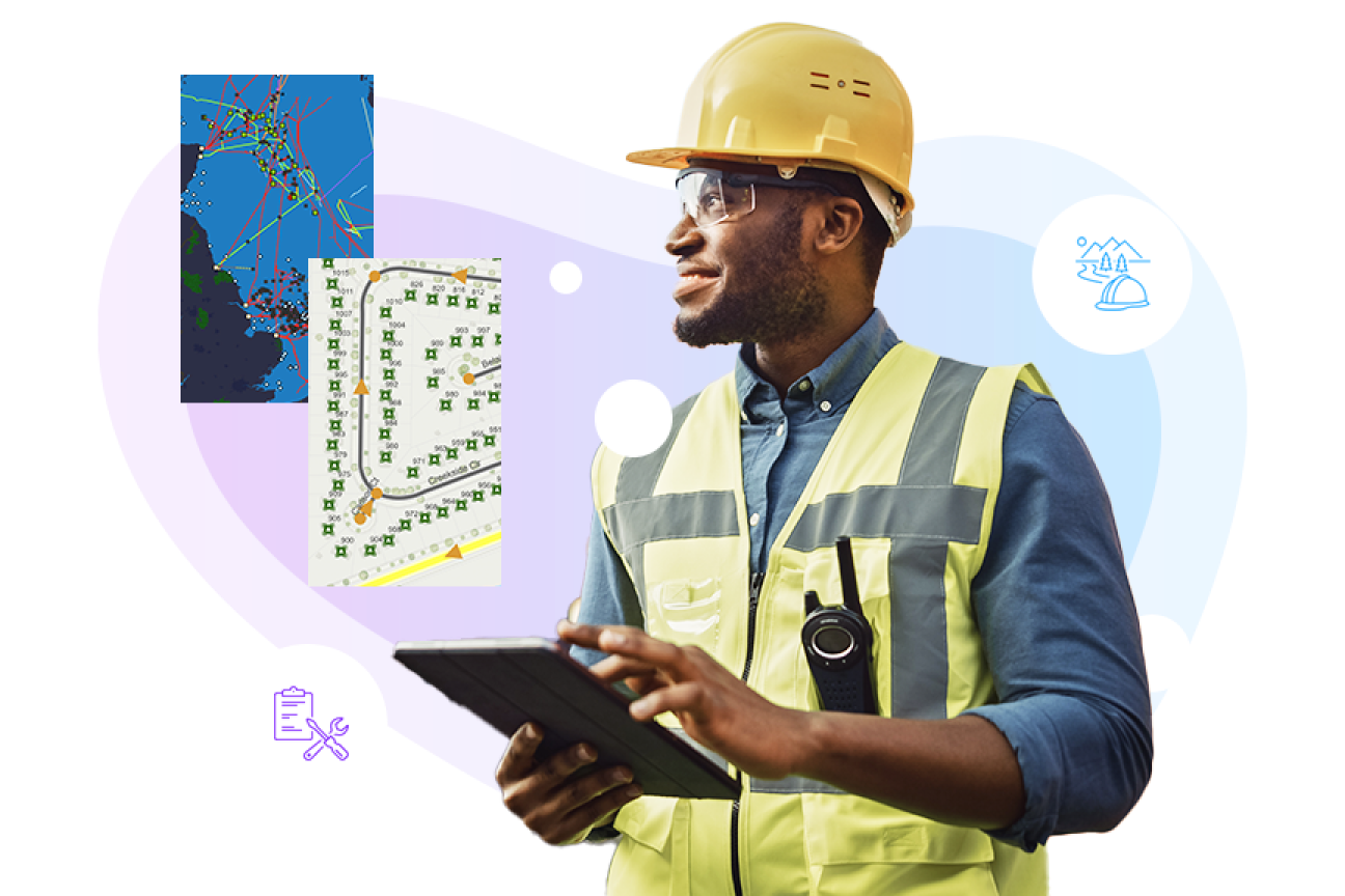 Person holding a tablet computer and wearing a hard hat, two maps of networks