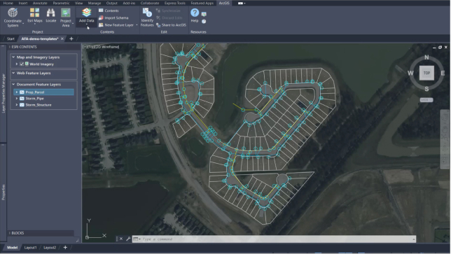 Serie di quadrati e linee connesse che rappresentano un tratto di abitazioni con una mappa di base di immagini e un riquadro di feature layer documento