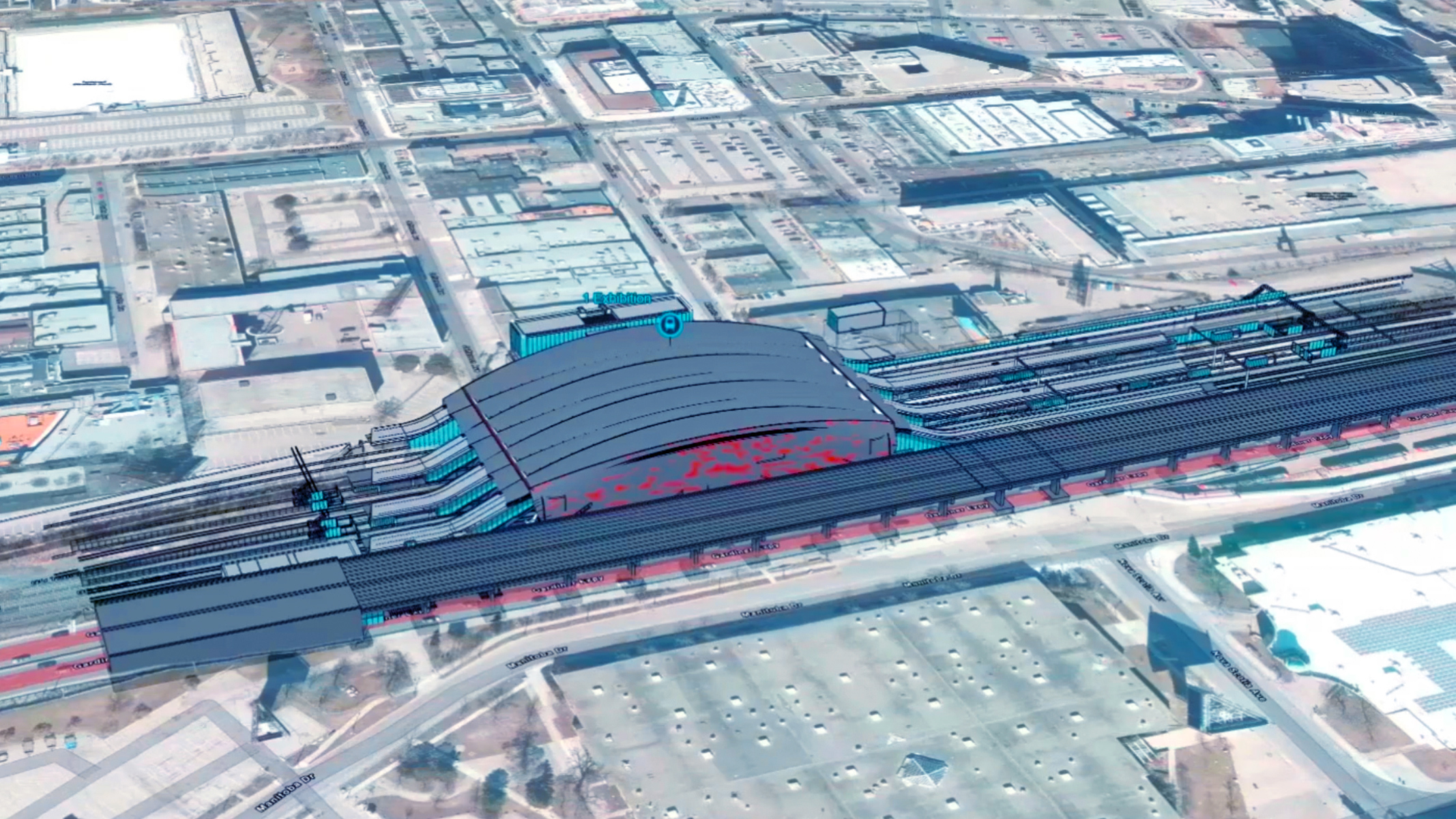 Aerial view of a structural design plan for a train station. It shows how the station would fit into the surrounding urban environment.