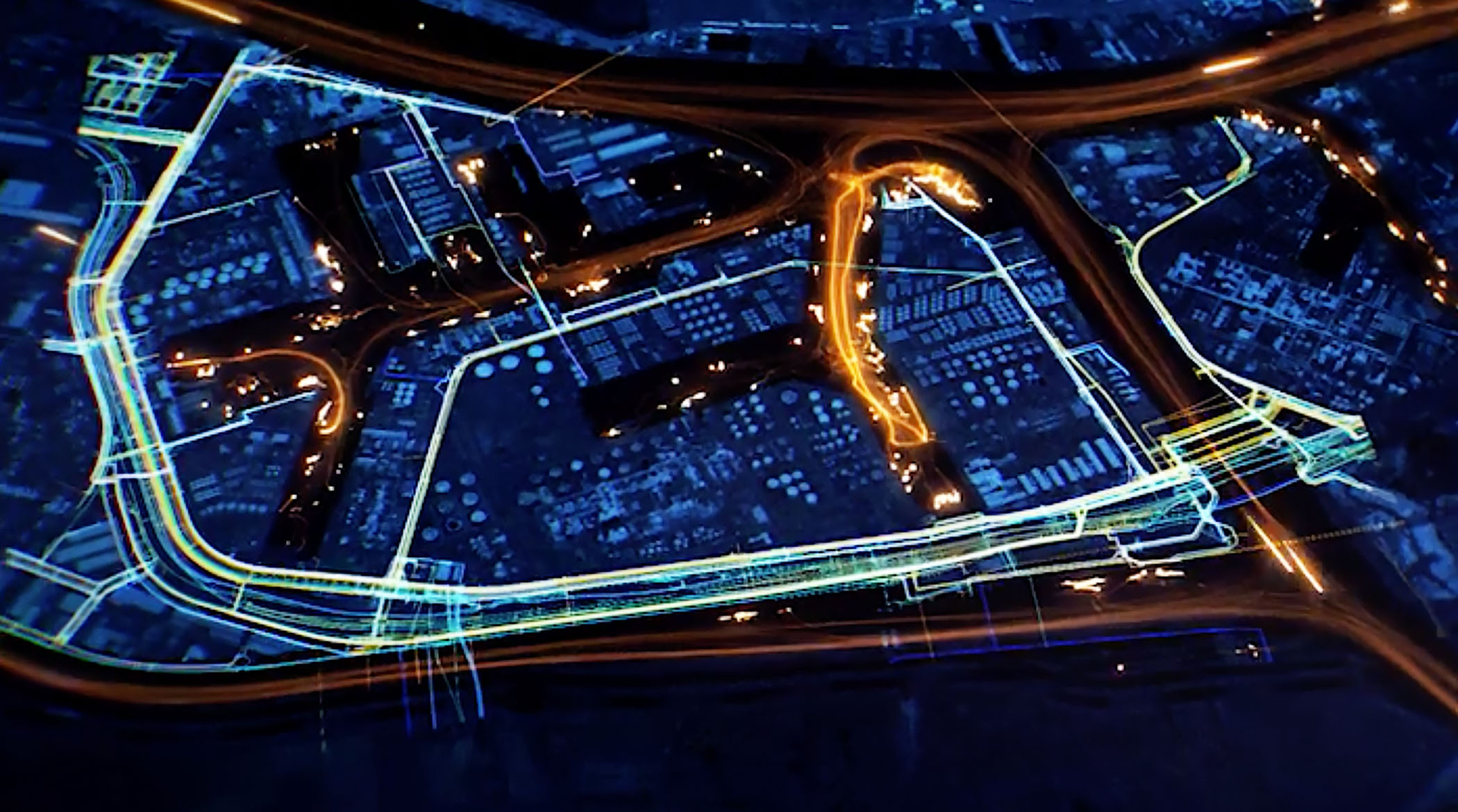 A stylized digital map of a city in dark colors with various routes and infrastructure glowing.