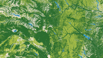 Una mappa di un'area rurale con terreno visualizzato in tonalità di verde e più specchi d'acqua in blu acceso