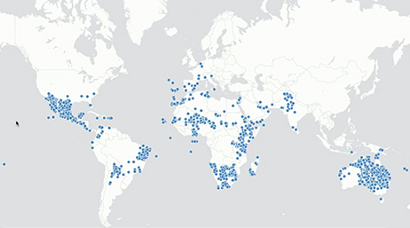 Mapa del mundo con marcadores azules dispersos en los continentes