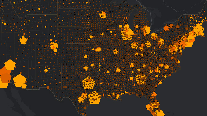 A map of the United States shows dark dots over counties across the country and bright orange clusters near several urban areas of the country.