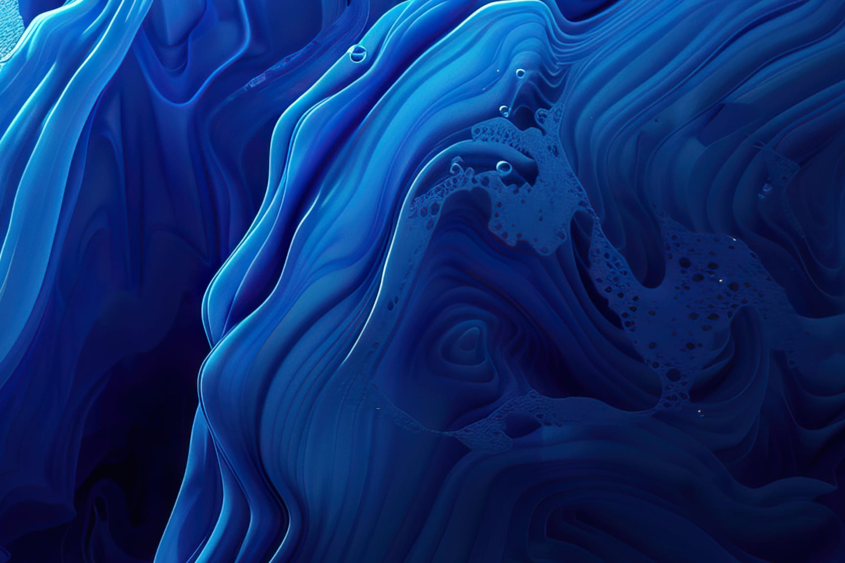 The image depicts an abstract bathymetry pattern of swirling, flowing blue liquid. Delicate bubbles are scattered throughout, adding an ethereal touch to the dynamic composition.