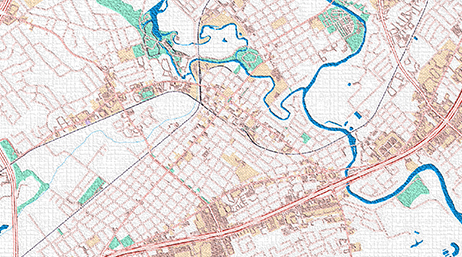 A street map of a city bisected by a river