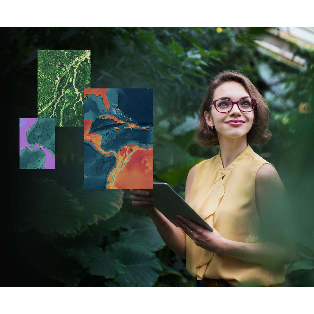 A young woman wearing glasses and a yellow shirt is holding a tablet while standing against a backdrop of trees, looking out into the distance. Alongside are colorful maps indicating what is on her tablet. 