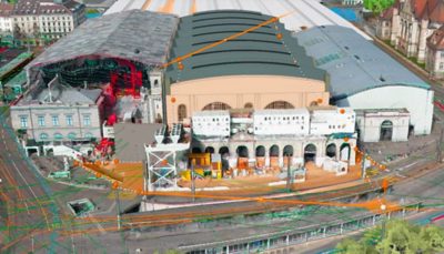 A view of a 3D model of a train station including marks and lines to show measurements and navigation routes.